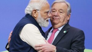 India's PM Narendra Modi hugging United Nations Secretary-General Antonio Guterres at Cop26. Photo: AFP
