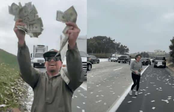 Commuters stop on US freeway to scoop wads of cash lying on road