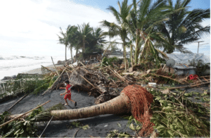 At least 12 dead as Philippines typhoon floods villages, uproots trees