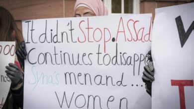 Photo of Syrian doctor on trial in Germany for crimes against humanity