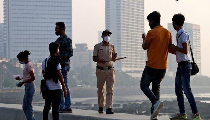 Delhi imposes weekend curfew as COVID cases multiply