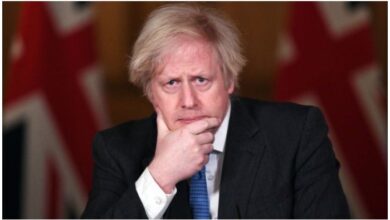 Photo of UK PM denies blackmailing Tory rebels