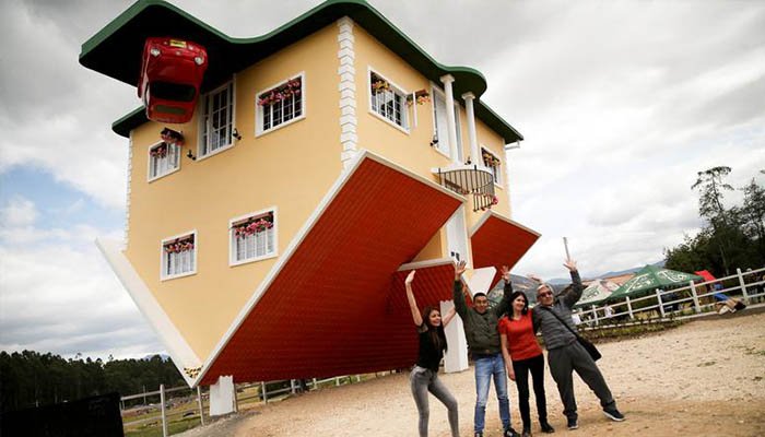 Upside-down house captures imagination of visitors looking for fun following restrictions