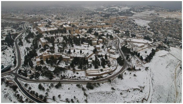 Jerusalem's holy sites and West Bank carpeted in rare snow