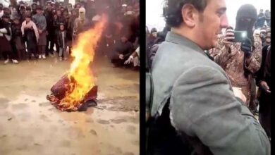 Photo of Taliban men laugh and burn instrument in front of weeping musician | Watch