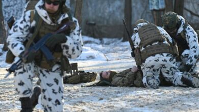 Photo of In Chernobyl ghost town, Ukraine forces train for combat