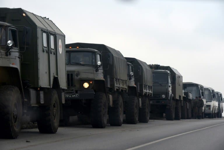 On Ukraine border, Russian soldiers await orders