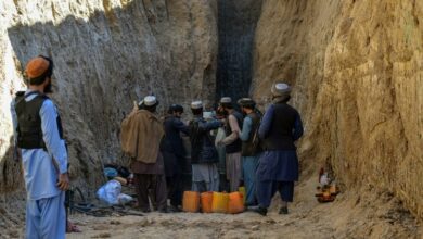 Photo of Rescuers near boy trapped in Afghan well, but rock blocks progress