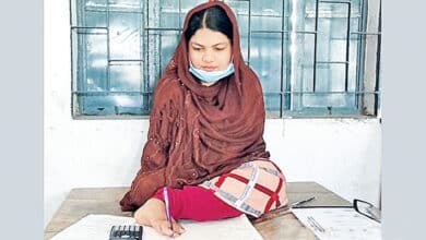 Photo of PM Hasina, her sister Rehana talk to Tamanna who scored GPA-5 in exam by writing with feet