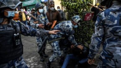 Photo of Nepal arrests dozens in protest against US grant