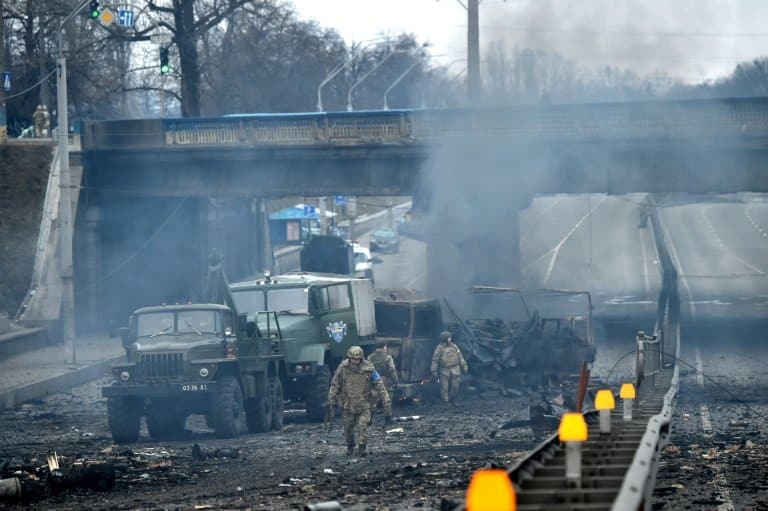 Kyiv civilians huddle in cellars as Russian forces attack