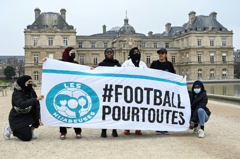 French minister condemns headscarf ban for Muslim footballers
