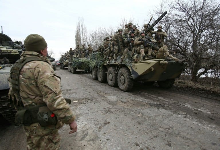Invading Russian forces press deep into Ukraine on second day of invasion