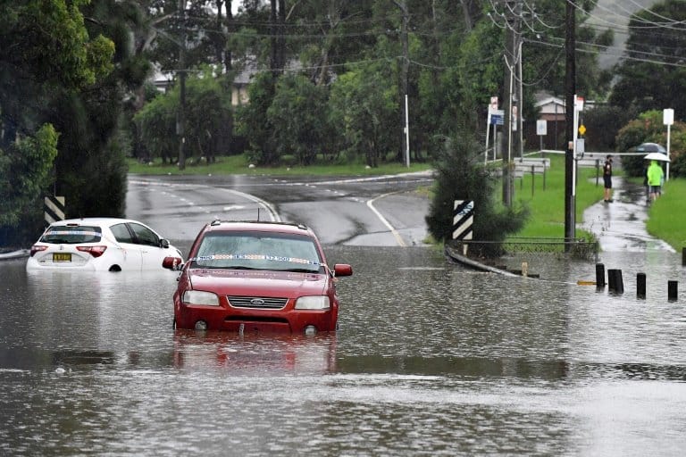 Australia floods force tens of thousands to evacuate