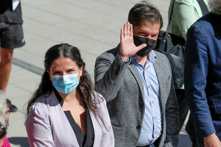 Boric begins Chile presidency alongside student comrades