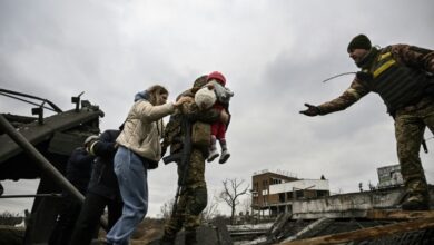 Photo of Mini Spiderman flees Irpin amid bodies and bombs