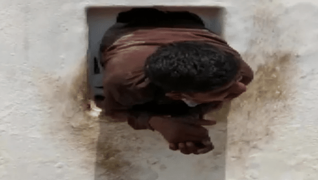 Thief gets stuck in wall hole while escaping temple he looted