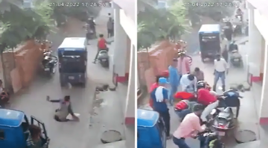 Watch: Woman falls into manhole while talking over phone