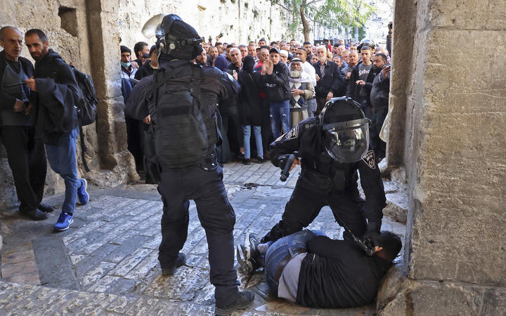 More than 150 Palestinians injured as Israeli police raid Al-Aqsa mosque