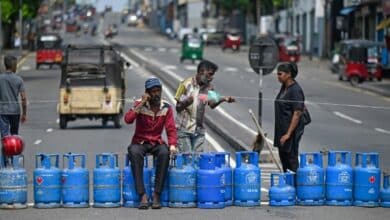 Photo of Crowds jeer Sri Lankan PM on rare outing