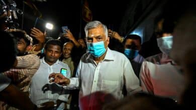Photo of Sri Lanka’s new PM struggles to form unity government