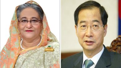 Photo of PM greets her new Korean counterpart