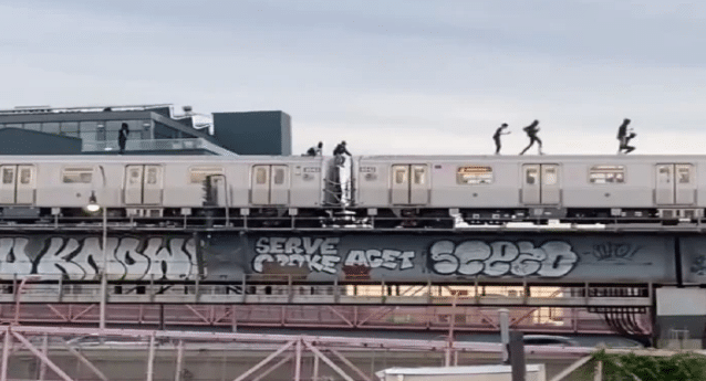 On camera: Thrill-seekers dance on top of moving train