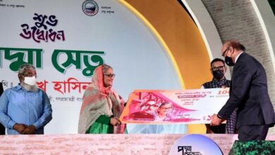 Photo of Commemorative Tk100 note, stamp out on Padma Bridge opening