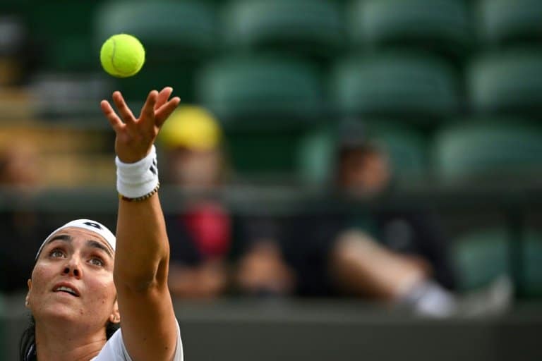 Jabeur fends off Mertens to reach Wimbledon quarters