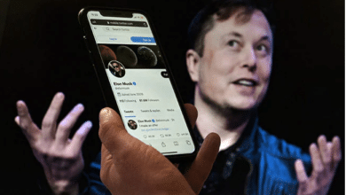 Photo of Elon Musk reacts after Twitter sues him