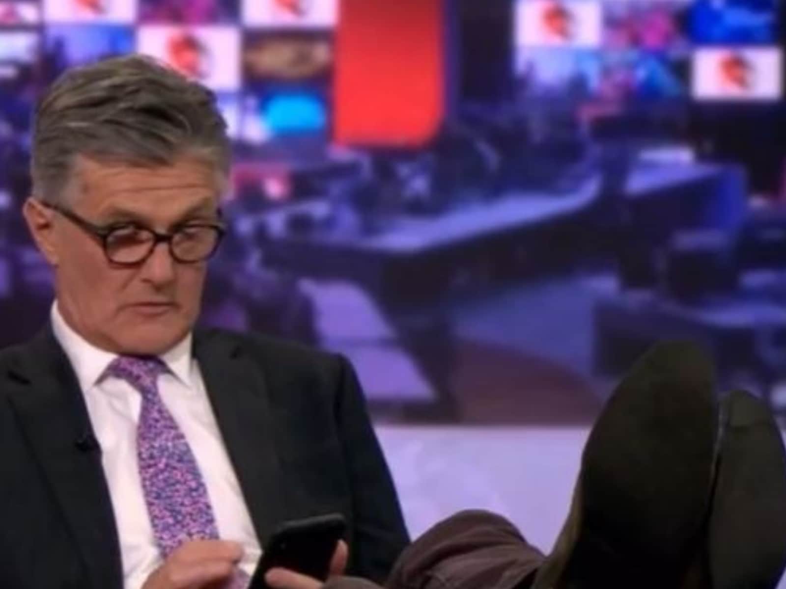 BBC anchor Tim Willcox caught off guard with feet on desk during live TV