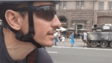 Photo of Watch: Ukrainian man spotted cycling through central Kyiv; here’s what he says about Russian military tanks
