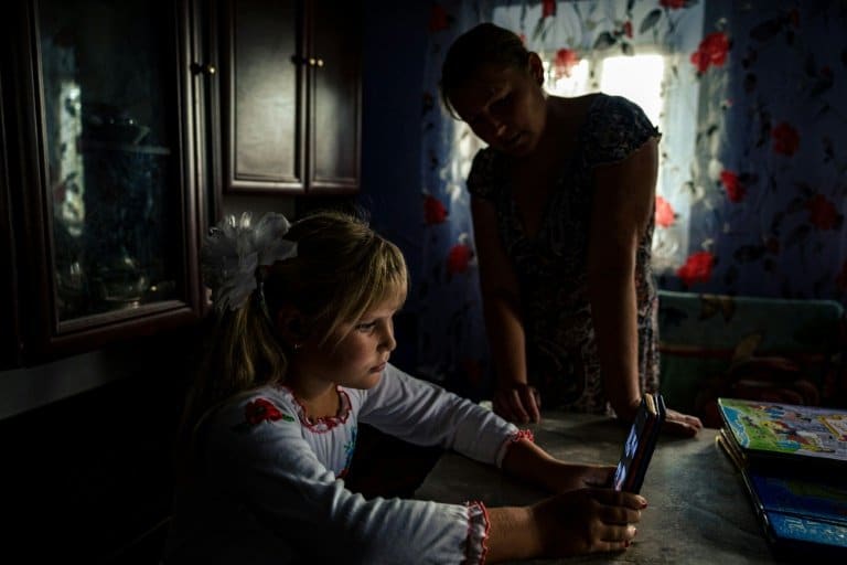 Ukraine schools return to sound of war
