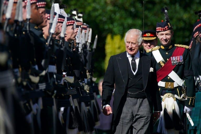 King Charles leads queen's coffin procession in Scotland