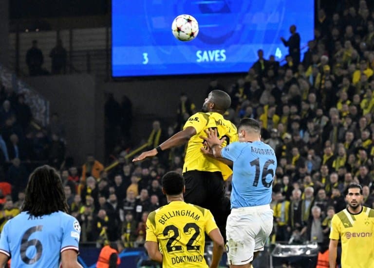 Champions League : Dortmund reach last 16 after Mahrez's penalty miss