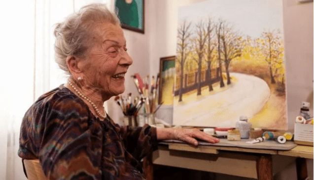 Woman marks 100th birthday by staging her own art exhibition