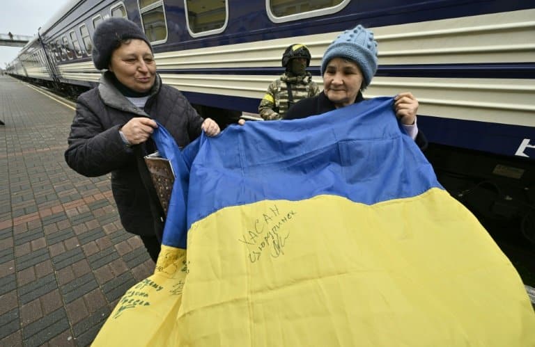 'We're free': Ukraine families reunite as Kherson train station reopens