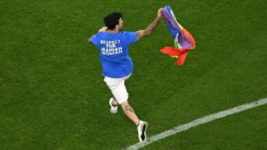 Photo of Man with rainbow flag invades pitch during World Cup match