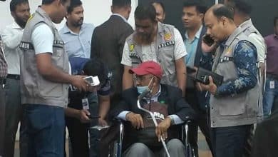 Photo of Joe Biden’s so-called adviser Mia Zahedul Islam Arefi held at airport, taken to DB custody